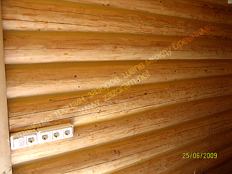 утепление деревянной мансарды герметиком в рубленом доме из бревна